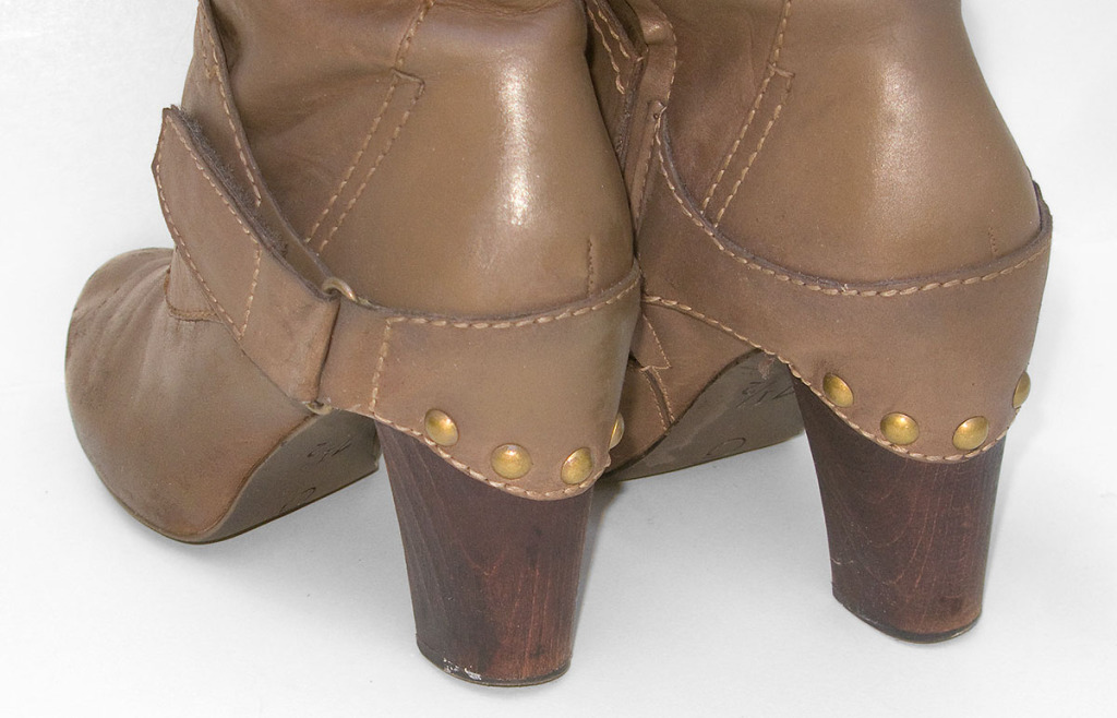 Most of the scuffs on the heels of the leather boots were removed