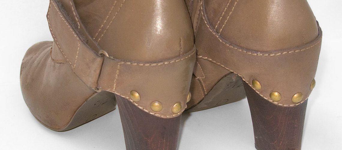 Most of the scuffs on the heels of the leather boots were removed